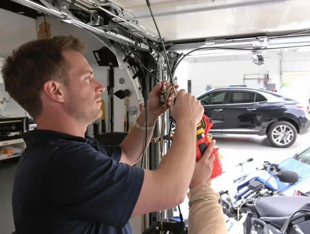 South Whittier Garage Door Repair safety certified technician performing cable replacement in South Whittier