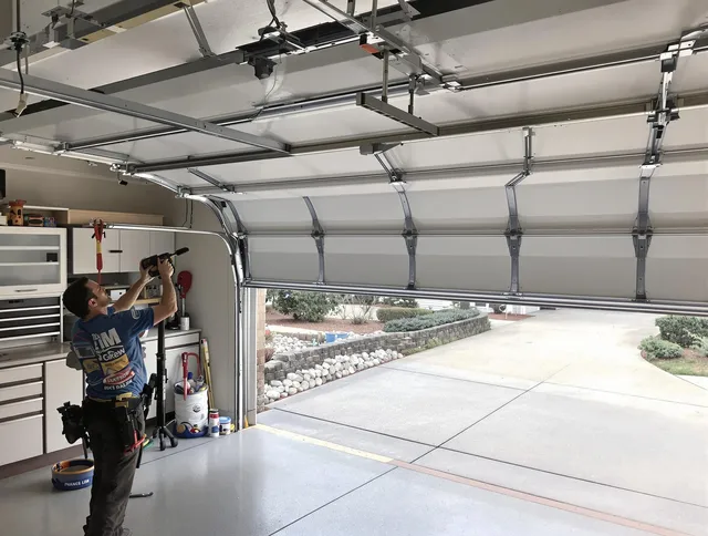 Garage door track repair service by South Whittier Garage Door Repair in South Whittier